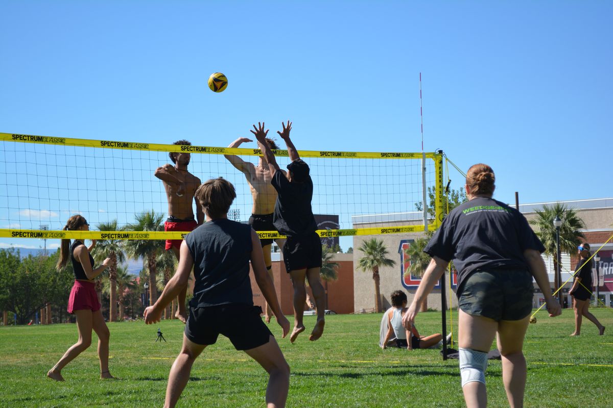 Net action at OVCU grass volleyball