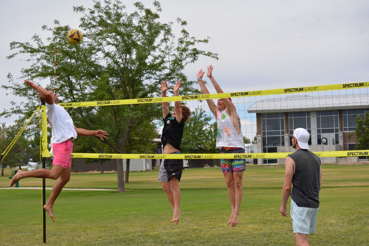 Player tossing serve at tournament